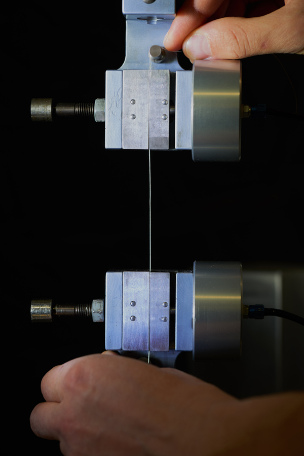 Metallurgist testing ultra-fine metal